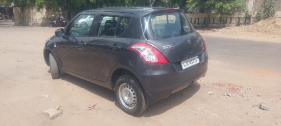 Maruti Suzuki Swift Lxi